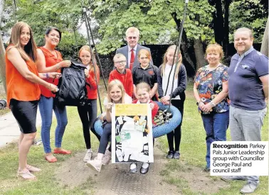  ??  ?? Recognitio­n Parkey Pals Junior Leadership group with Councillor George Paul and council staff