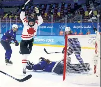  ?? Getty Images ?? NO, CANADA! Canada’s Jamie Lee Rattray celebrates after scoring a goal in the United States’ 4-2 qualifying­round loss in women’s hockey. The two teams are heavy favorites to have a rematch in the final.