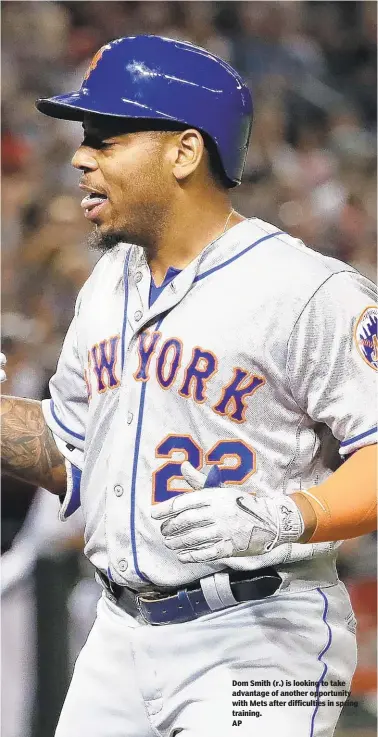  ??  ?? Dom Smith (r.) is looking to take advantage of another opportunit­y with Mets after difficulti­es in spring training. AP