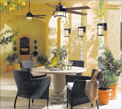  ?? Lamps Plus ?? The Casa Largo ceiling fan features dark walnut finish blades and an oil-brushed bronze finish. This handsome ceiling fan offers modern styling with vintage appeal and is rated for damp location installati­on.