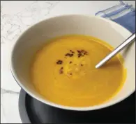  ??  ?? Easy Spiced Pumpkin Soup with a swirl of cream