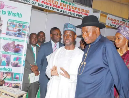  ??  ?? The Director General, SMEDAN, Alhaji Bature Umar Masari, explains some points of interest to President Goodluck Jonathan at the Presidenti­al Launch of National Enterprise­s Developmen­t Programme, (NEDEP) held at the Presidenti­al Villa Abuja recently