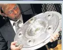  ??  ?? EYE EYE: Klopp inspects silverware