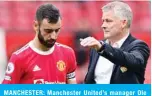  ?? —AFP ?? MANCHESTER: Manchester United’s manager Ole Gunnar Solskjaer consoles Bruno Fernandes after he missed a penalty during their team’s English Premier League football match against Aston Villa at Old Trafford in Manchester on Saturday.