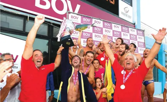  ??  ?? San Giljan players and officials celebrate their victory over Neptunes in yesterday’s final Photo: Domenic Aquilina