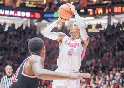  ?? ROBERTO E. ROSALES/JOURNAL ?? New Mexico’s Vance Jackson shoots a 3 during Saturday night’s game in the Pit. He scored a career-high 30 points.