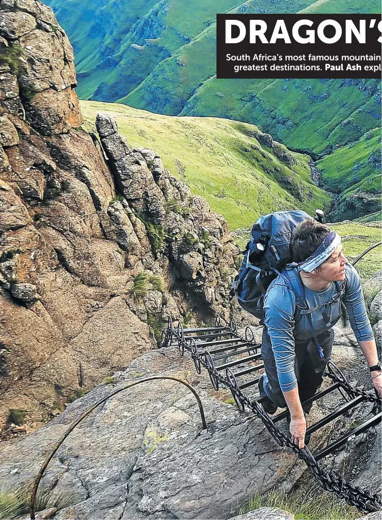  ??  ?? UP AND AWAY: June Fabian tackles the chain ladders at the start of the Drakensber­g Grand Traverse