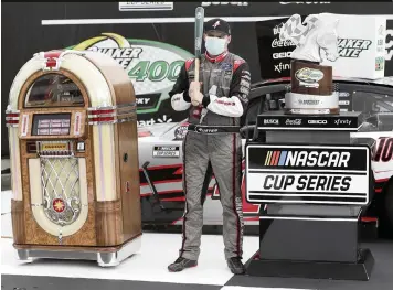  ?? MARK HUMPHREY AP ?? Cole Custer celebrates in Victory Lane with the trophy following the NASCAR Cup Series race Sunday, his second at the Sparta, Kentucky, track after winning an Xfinity Series race there last year. ‘This place is my track. Got this place figured out.’