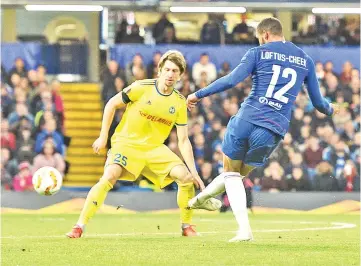  ?? — AFP photo ?? Chelsea’s English midfielder Ruben Loftus-Cheek (R) scores his hat-trick and his team’s third goal during the UEFA Europa League Group L football match between Chelsea and Bate Borisov at Stamford Bridge in London on October 25, 2018.