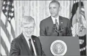  ?? Mandel Ngan AFP/ Getty I mages ?? NIH DIRECTOR Francis Collins is recognized by President Obama at the White House last year.