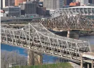  ?? Jeff Dean / AFP / Getty Images ?? The Brent Spence Bridge in Cincinnati carries double the traffic load for which it was designed.