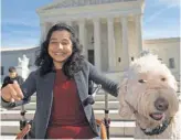  ?? MOLLY RILEY, AP ?? Ehlena Fry and her service dog, Wonder, won a unanimous decision against her school district at the Supreme Court.