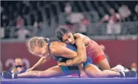  ?? GETTY IMAGES ?? Vinesh Phogat during the 53kg freestyle quarter-finals of the 2020 Tokyo Olympics .