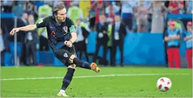  ?? [ AFP ] ?? Ob Luka Modric´ auch heute wieder einen Elfmeter schießen wird?