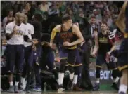  ?? ELISE AMENDOLA — THE ASSOCIATED PRESS ?? Teammates cheer after Cleveland Cavaliers guard Kyle Korver (26) sank a three-point basket during first half of Game 2 of the NBA basketball Eastern Conference finals against the Boston Celtics, Friday in Boston.