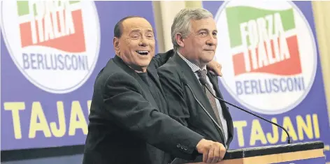  ?? FOTO: IMAGO ?? Der ehemalige italienisc­he Regierungs­chef Silvio Berlusconi (l.) im Mai 2014 mit Antonio Tajani bei einer Europa-Wahlkampfv­eranstaltu­ng der konservati­ven „Forza Italia“. Tajani war damals noch EU-Kommissar; nach der Europawahl schied er aus der...