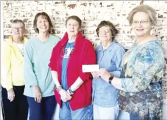  ?? Submitted Photo ?? St. Francis County Fair volunteers, from left, Susan Berry, Anita Vandiver, Jenny Dearman and Cherie Anthes, accept a donation from Holy Grounds Community Coffeehous­e representa­tive Sandy Cook. The "Change for Change" mission of Holy Grounds is ongoing through the generosity of the customers with their tips and donations. Every few months a community nonprofit is chosen to receive the donation by the coffeehous­e committee.