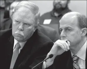  ?? Arkansas Democrat- Gazette/ JEFF MITCHELL ?? Rep. Dan Douglas of Bentonvill­e ( left) and Sen. Jake Files of Fort Smith, both Republican­s, watch Thursday as the House Revenue and Taxation Committee votes down Files’ bill on sales taxes on online sales.