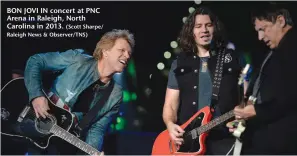  ?? (Scott Sharpe/ Raleigh News & Observer/TNS) ?? BON JOVI IN concert at PNC Arena in Raleigh, North Carolina in 2013.