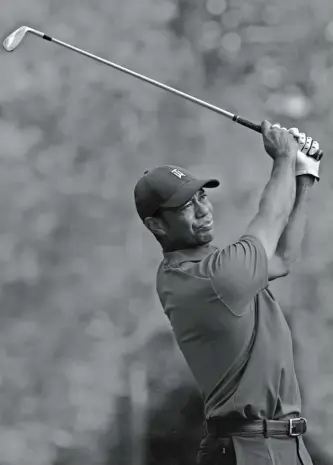  ?? CHARLIE RIEDEL/AP ?? Tiger Woods, the surprise Masters winner in 2019, practices Monday at Augusta National.