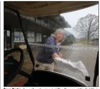  ?? (Arkansas Democrat-Gazette/Thomas Metthe) ?? Dawn Darter, the golf profession­al at The Greens at North Hills in Sherwood, wipes down a golf cart at the course Thursday. While Little Rock city courses are shut down, some others are taking extra precaution­s amid concerns of the coronaviru­s outbreak.