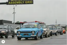  ?? ?? 7. The Classic Trials cars line up on the dummy grid;