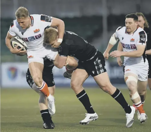  ??  ?? 0 Glasgow’s Kyle Steyn tackles Edinburgh winger Duhan ven der Merwe during last night’s Pro14 Rainbow Cup match at Scotstoun