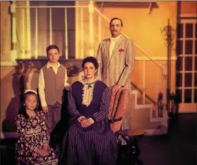  ?? PHOTO BY KATHI CHRISTIE ?? Shown in this Banks Family portrait are Bridget Ottinger, left, as Jane Banks (on knees), Zach Green as Michael Banks, Lindsey Villecco as Mrs. Banks (seated) and Jordan Baylor as Mr. Banks.