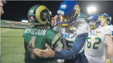  ??  ?? Regina Rams quarterbac­k Noah Picton and UBC pivot Michael O’Connor pay some post-game respects after the Thunderbir­ds’ 40-34 win Saturday.