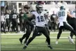  ?? BILL KOSTROUN — THE ASSOCIATED PRESS ?? Philadelph­ia Eagles quarterbac­k Gardner Minshew passes during the first half of an NFL football game against the New York Jets, Sunday, Dec. 5, 2021, in East Rutherford, N.J.