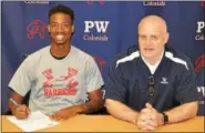  ?? SUBMITTED PHOTO ?? Plymouth Whitemarsh High School (PWHS) senior Ish Horn has signed a letter of intent to play basketball at East Stroudsbur­g University next season. Pictured: Ish Horn and Head Coach Jim Donofrio.