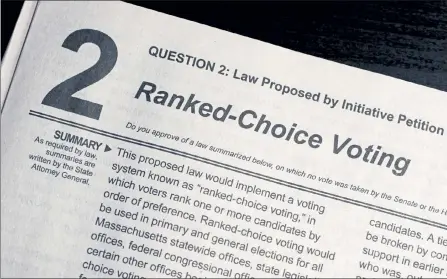  ?? BILL SIKES / AP ?? A summary of Ballot Question 2, known as a ‘Ranked Choice Voting’ law, in the Nov. 3, 2020, Massachuse­tts election is displayed in a handbook provided to voters by the Secretary of the Commonweal­th.