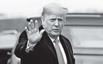  ?? ANDREW CABALLERO-REYNOLDS/GETTY-AFP ?? President Donald Trump boards Air Force One as he heads to the Army-Navy football game in Philadelph­ia on Saturday.