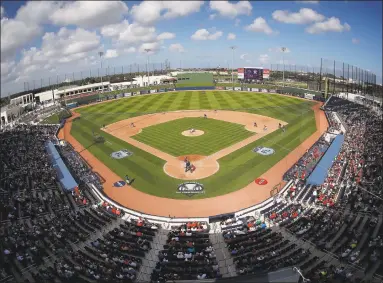  ?? John Bazemore / Associated Press ?? The Ballpark of the Palm Beaches in West Palm Beach, Fla serves as the spring training home for both the Astros and the Nationals.