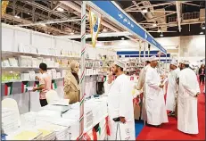  ??  ?? Some of the Omanis visiting the KU’s Academic Publicatio­n Council booth at
the 22nd Muscat Int’l Book Fair.