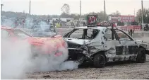  ??  ?? Collisions were no accident when Merrittvil­le Speedway had a demolition derby for compact cars Saturday in Thorold.