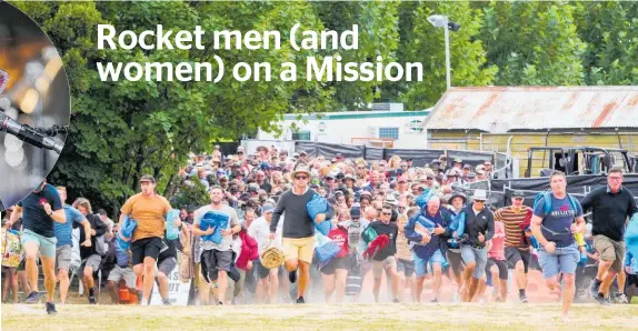  ?? Photo / Paul Taylor ?? Fans rush to get the best spots for Sir Elton John’s final Napier concert at the Mission Estate Winery.