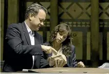  ?? PHOTO: SUPPLIED ?? Tom Hanks and Felicity Jones takes a rare breather from Inferno’s infurnal footchases.