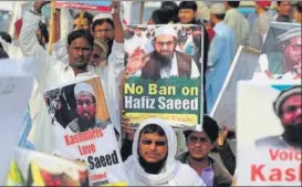  ?? AFP FILE ?? Pakistani supporters of the JamaatudDa­wah protest after leader Hafiz Saeed was placed under house arrest by authoritie­s in Karachi on February 3.