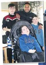  ??  ?? HAPPY EASTER: Wigan’s Willie Isa and team-mates paid a visit to the Derian House Children’s Hospice