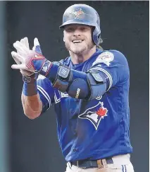  ?? THE CANADIAN PRESS/FILES ?? Josh Donaldson says “a little freak accident” injured his calf, but he expects he’ll be ready to play when the Toronto Blue Jays begin the regular season on April 3.