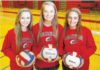  ?? STAFF PHOTO BY ERIN O. SMITH ?? Ooltewah High School volleyball players Ally Chernak, Macy Milliken and Tyler Sullivan each is the last in her family to play volleyball at Ooltewah after they all had older siblings play ahead of them.