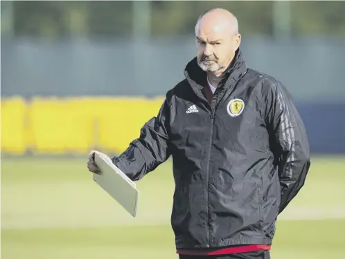  ??  ?? 0 With football in shutdown due to the coronaviru­s pandemic, Scotland head coach Steve Clarke will receive a reduction in salary.