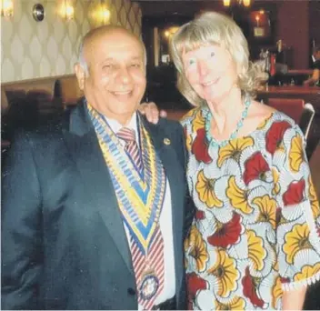  ??  ?? Rotary Club of Sunderland President Sharad Trivedy presents a cheque for £1,000 to Lynne Symonds for the Wulugu Project.