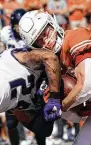  ?? Eric Gay / Associated Press ?? Texas wide receiver Jake Smith, right, made his season debut in the Longhorns' loss to TCU.