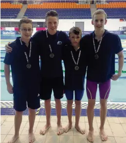  ??  ?? Team effort East Kilbride’s 4 x 200m Freestyle Relay stars Keir Buchanan, Jonathan Christie, Dylan Sommervill­e, Scott Gibson