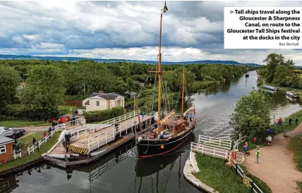  ?? Ben Birchall ?? Tall ships travel along the Gloucester & Sharpness Canal, on route to the Gloucester Tall Ships festival at the docks in the city