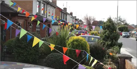  ??  ?? At a time when the world might need a bit colour, residents in Newfield decided to do their bit and erected bunting in support of the frontline workers in this pandemic.