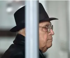  ??  ?? In this 2013 file picture, Ion Ficior, former commander of the Periprava communist labor camp, waits for registrati­on at the general prosecutor­s office in Bucharest, Romania. AP PhoTo/VAdIM GhIRdA