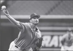  ?? Tampa Bay Times via AP of at ?? Tampa Bay Rays starting pitcher Zach Eflin (24) delivers in the first inning a spring training baseball game against the Minnesota Twins on Thursday Tropicana Field in St. Petersburg, Fla.